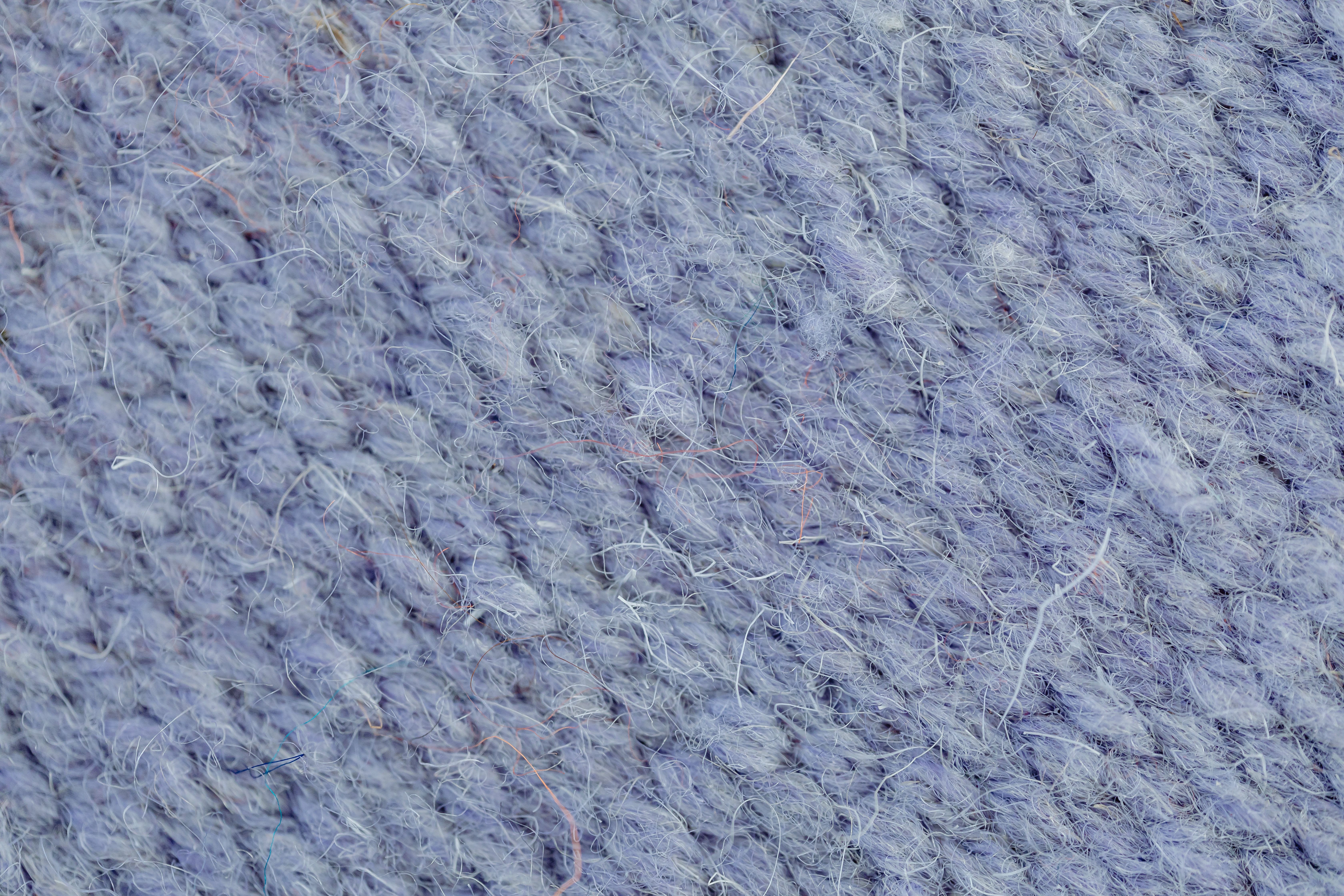 Textura de tapete de lã em close-up mostrando o tecido